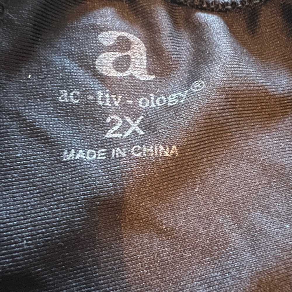 Loose black active pants. Average length, too long for petite.